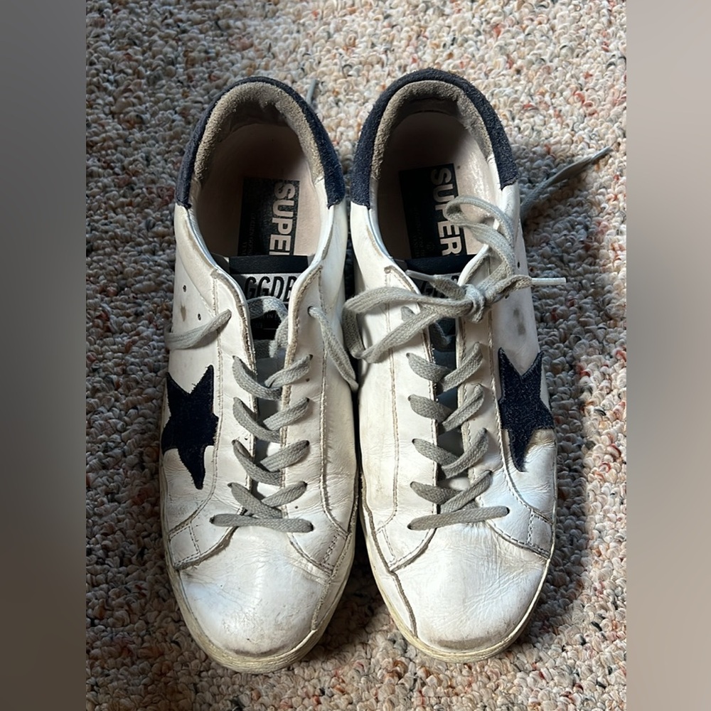 Navy star golden goose. Size 39 EUR (fits a size 8.5-9).